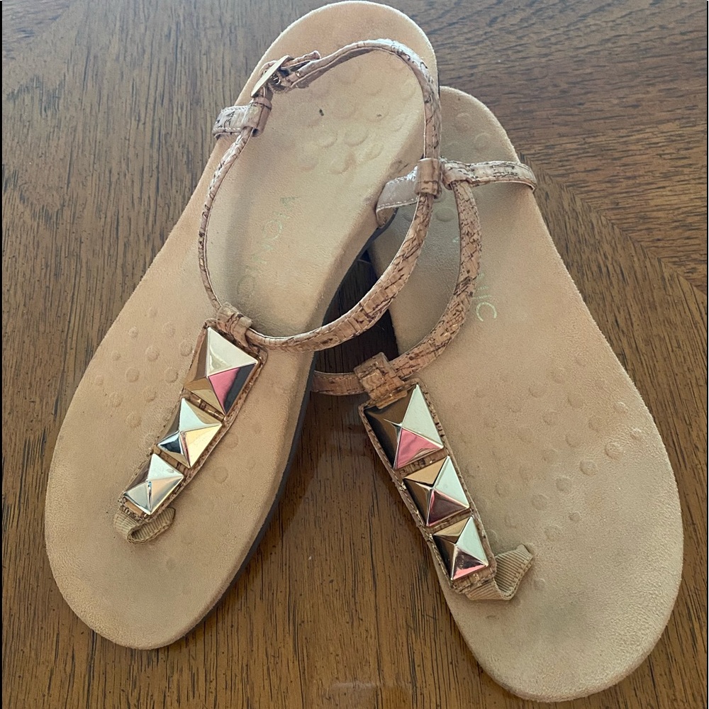 Vionic sz 9 sandals.  Great condition.  Cork colored with brass decoration.